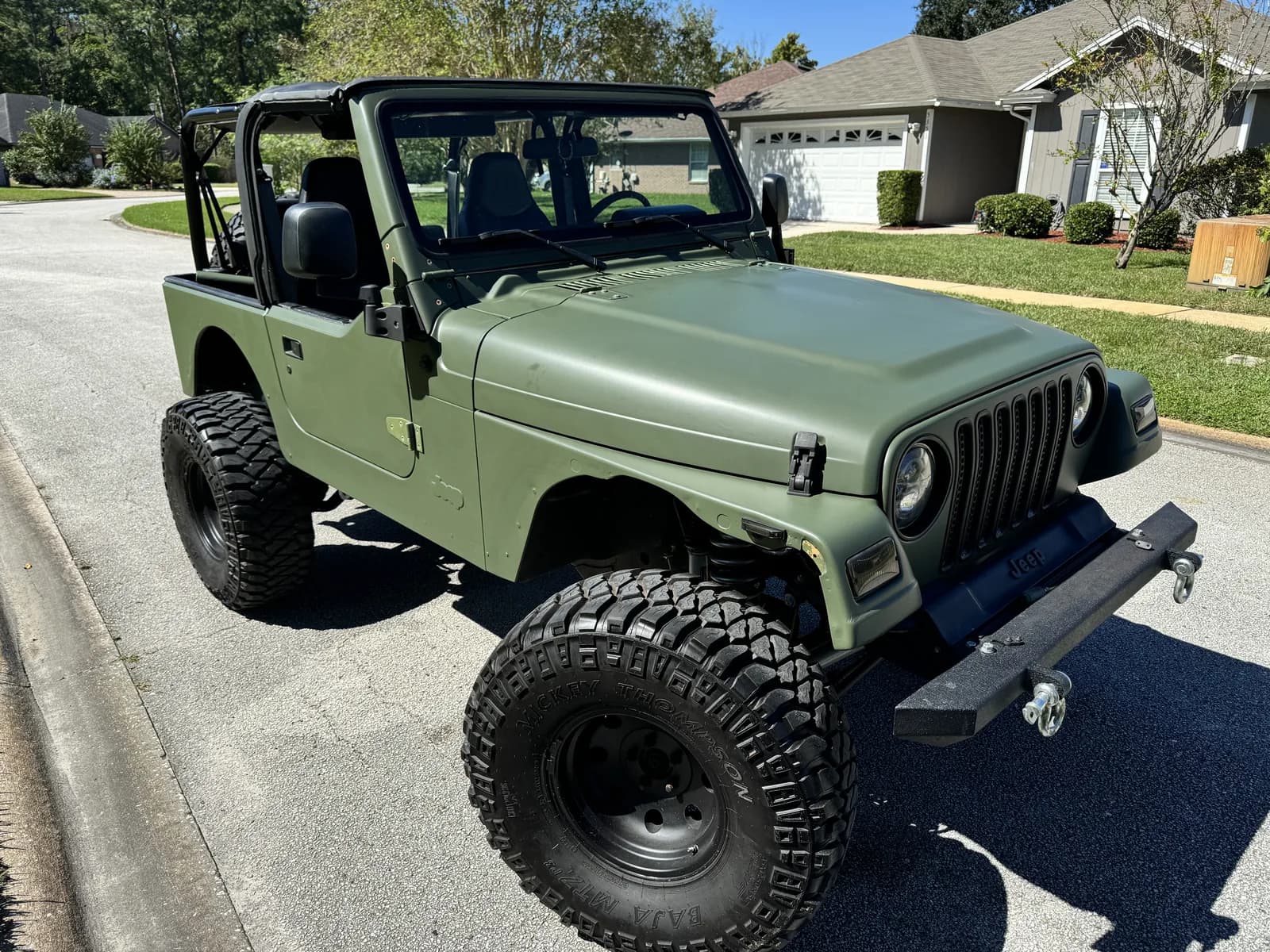 Jeep Wrangler wrapped in olive green