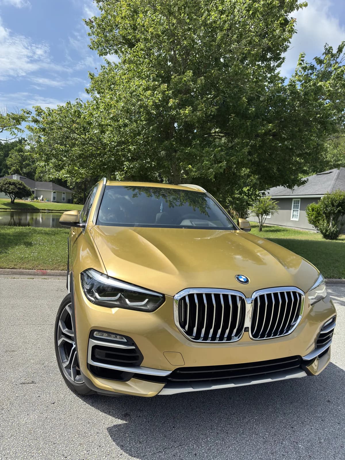 Front of a BMW X5 wrapped in gold