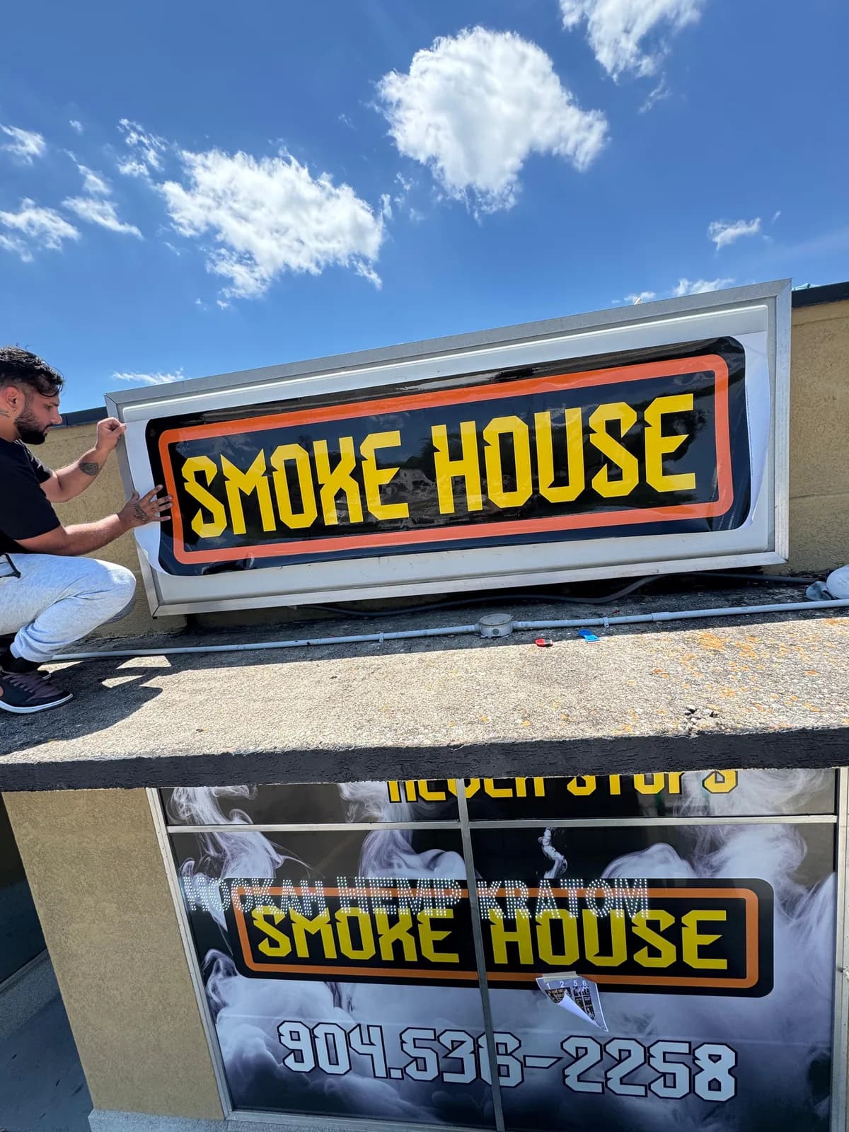 Illuminated smoke house sign built and installed