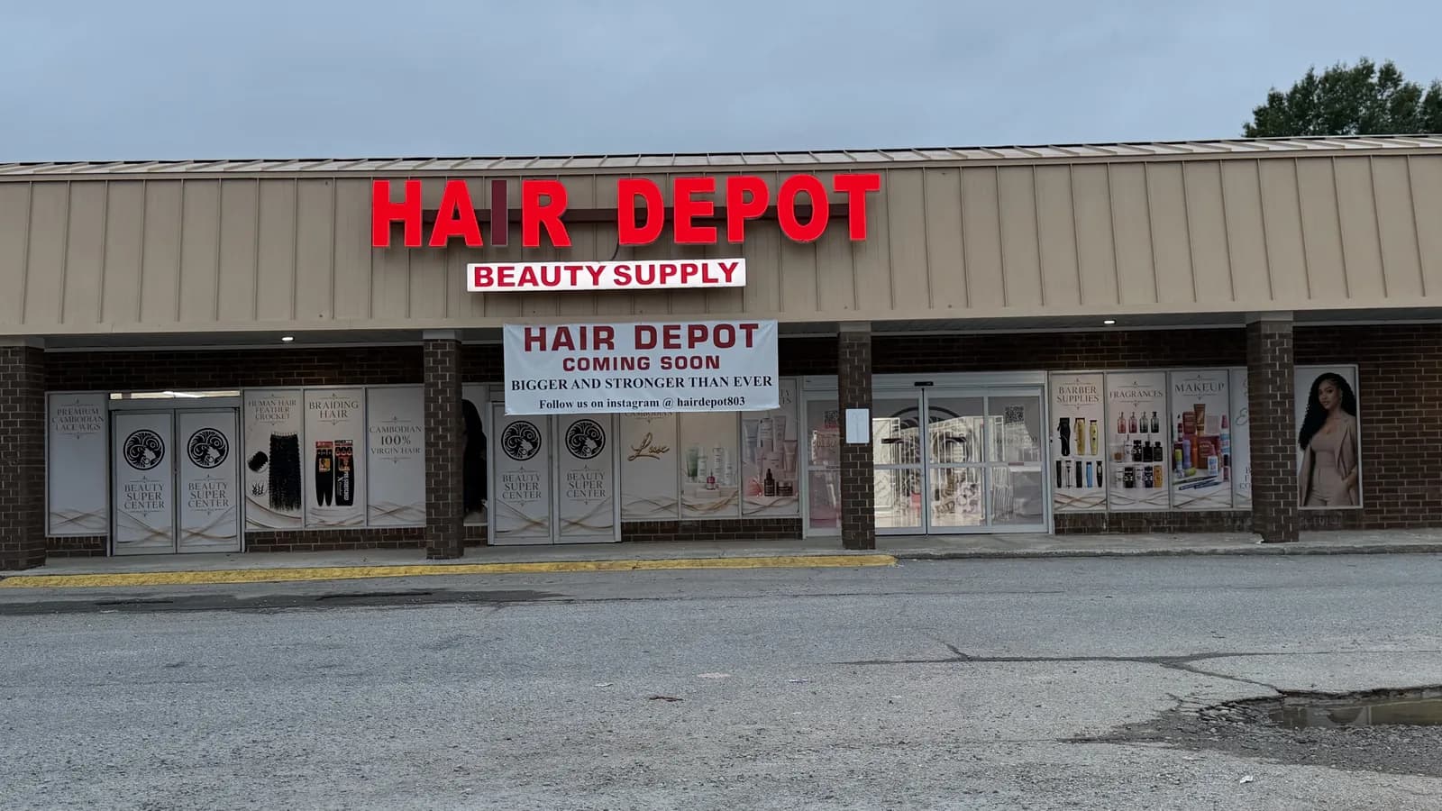 Storefront of a beauty supply shop with window signage