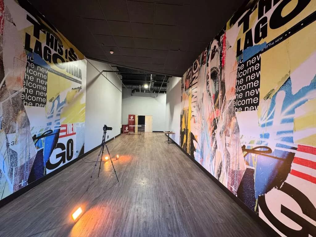 Corridor with full-height printed graffiti-style wall graphics